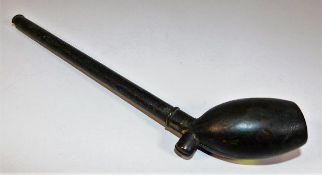 An early brass cased pipe
