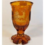 A c.1900 Bohemian glass goblet with etched deer de