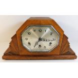 An art deco mantle clock, small loss to veneer 16.