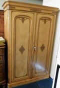 A decorative Victorian compactum wardrobe with int