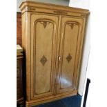 A decorative Victorian compactum wardrobe with int