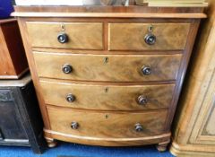 A Victorian bow fronted chest of five drawers 46in