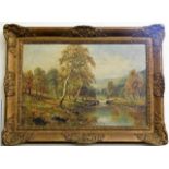 A gilt framed landscape oil on canvas depicting a