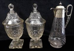 A large pair of early 19thC. cut glass lidded swee