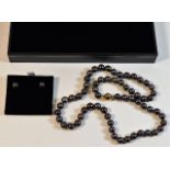 A boxed set of Tahitian pearl necklace 27g 16in lo