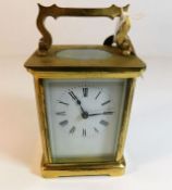A brass carriage clock 5.25in high