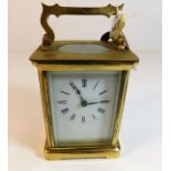 A brass carriage clock 5.25in high