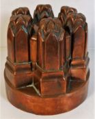 A decorative Victorian copper jelly mould 5in high