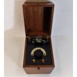 A mahogany cased early radio receiver