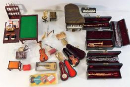 A quantity of mixed dolls house miniature musical