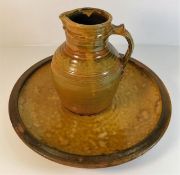 A studio pottery jug 9in high & platter 15in diame