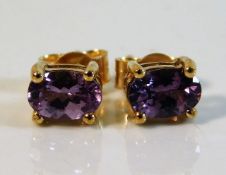 A pair of 9ct gold amethyst earrings 1.2g