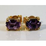 A pair of 9ct gold amethyst earrings 1.2g