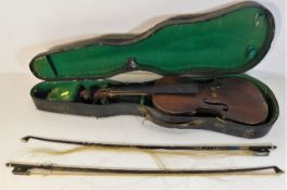 A cased antique violin with one piece back & well