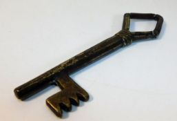 A bronze key 4.75in long