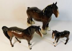 Three Beswick horses, including a shire horse