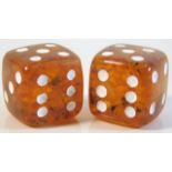 A pair of amber dice