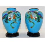 A pair of Chinese cloisonne vases with dragon deco