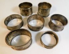 Seven mixed silver napkin rings 125g