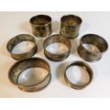 Seven mixed silver napkin rings 125g