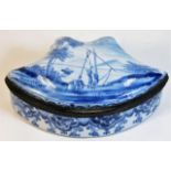 An 18thC. Dutch delft box with river scene to top