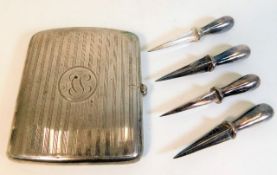 A Birmingham silver cigarette case by William Henr