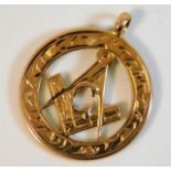 A 9ct gold masonic pendant with initial G 4.4g