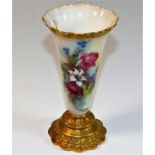 A Royal Worcester floral vase with gilded decor 6.