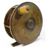 An antique brass fly fishing reel 4.5in diameter