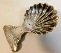 A scalloped edge Sheffield silver caddy spoon by W