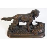 An antique bronze dog with fayre signed LV numbere