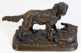 An antique bronze dog with fayre signed LV numbere