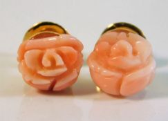 A pair of 18ct gold pink coral earrings 3.2g £100-