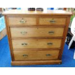 A large c.1900 oak chest of five drawers with bras