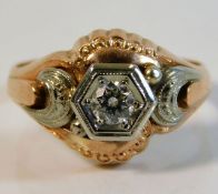 An art deco 12ct two colour gold continental ring