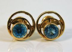 A 14ct gold pair of earrings set with topaz 2.3g