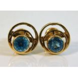 A 14ct gold pair of earrings set with topaz 2.3g