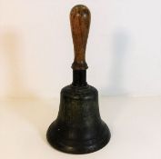 A large hand bell marked J2 12in tall