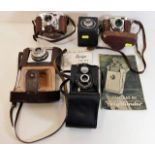 Five vintage cameras including a Voigtlander Proot