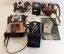 Five vintage cameras including a Voigtlander Proot