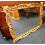A 19thC. carved wood gilded framed mirror 29in wid