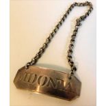 A white metal Vidonia decanter label 7.8g