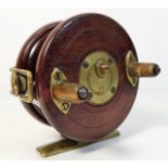An antique wooden & brass star back fly fishing re