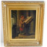 A 19thC. oil of choir boy doing a reading in gilt