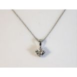 A platinum necklace & pendant set with 0.6ct diamo