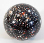 A large multi coloured glass marble