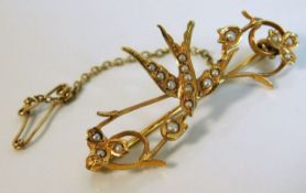 A 15ct gold swallow brooch set with seed pearls 4