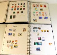 Three albums of world stamps, approx. 302 pages to