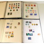 Three albums of world stamps, approx. 302 pages to