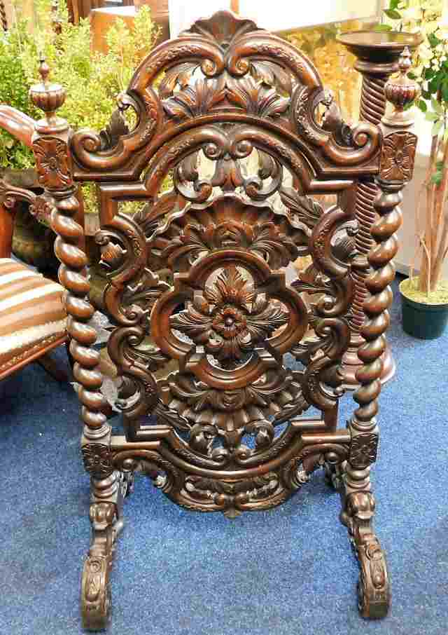 An unusual decorative 19thC. carved screen with ba